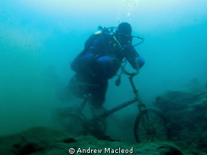 A bike in lake Baikal by Andrew Macleod 